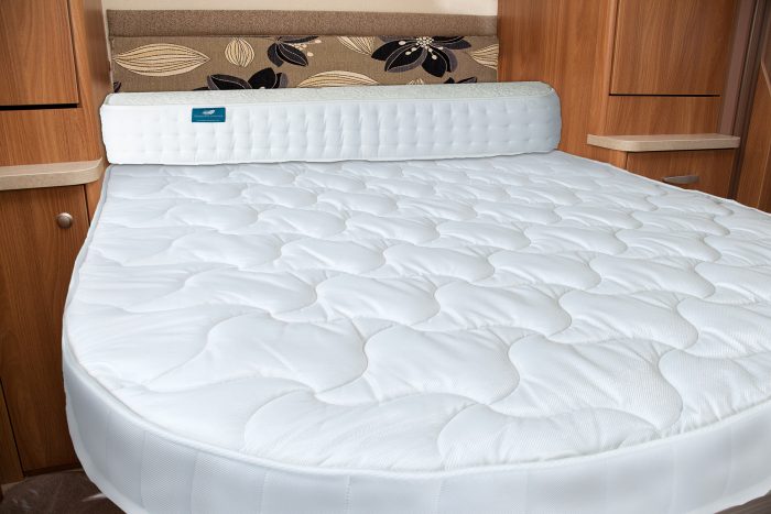 island bed with bolster mattress