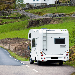 Motorhome driving down a road in the UK
